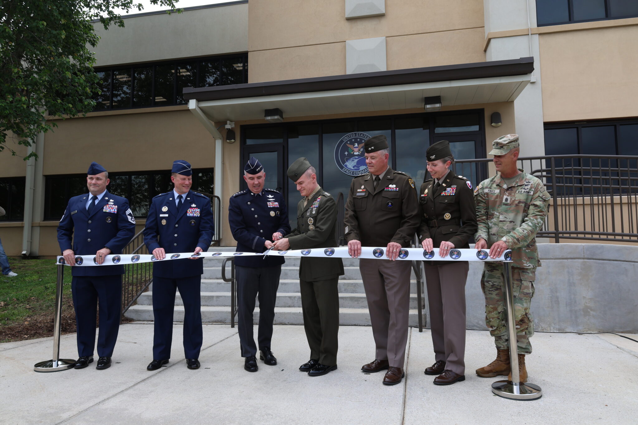 Gen. Stephen Whiting and Lt. Gen. James Adams cut ribbon at Redstone Arsenal